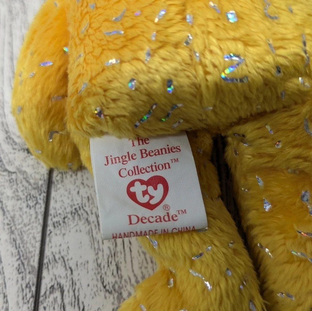 Ty Decade Sparkling Yellow Bear with Blue Ribbon and Bell